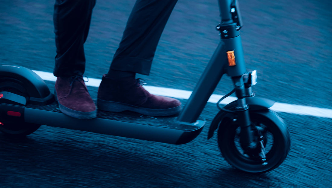 a man riding eltra67 electric scooter from eltra store 